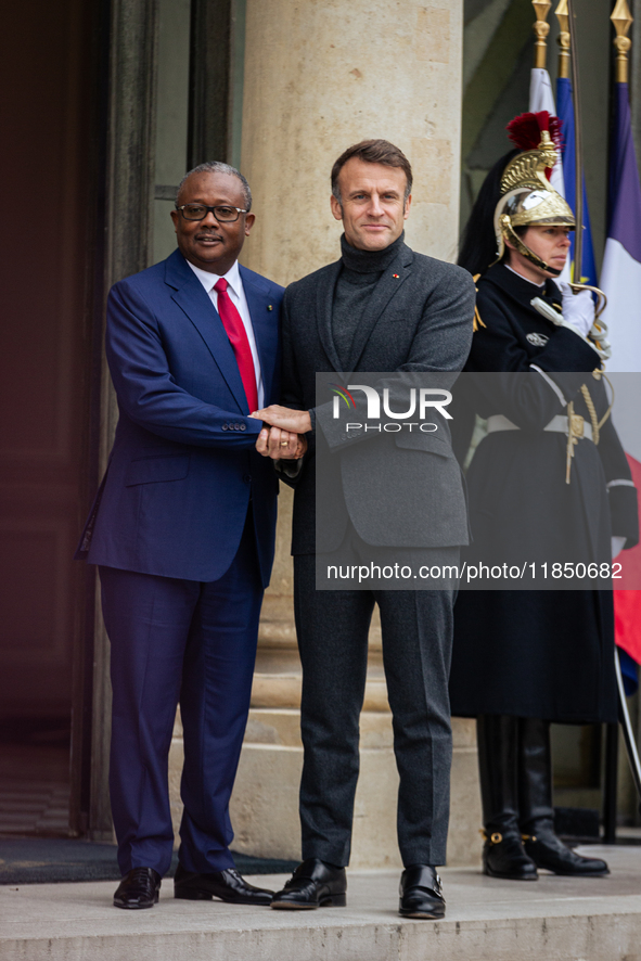 French President Emmanuel Macron welcomes Umaro Sissoco Embalo, the President of Guinea-Bissau, at the Elysee Palace in Paris, France, on Se...