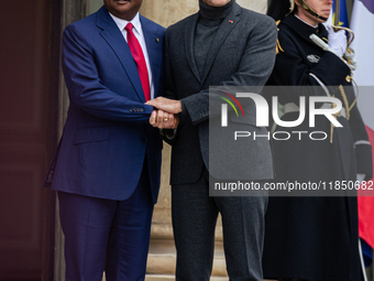 French President Emmanuel Macron welcomes Umaro Sissoco Embalo, the President of Guinea-Bissau, at the Elysee Palace in Paris, France, on Se...