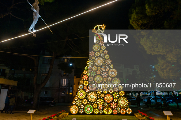 A Christmas tree stands in the Municipal Villa of Ruvo di Puglia on December 8, 2024. The courses and streets of Ruvo di Puglia's historic c...