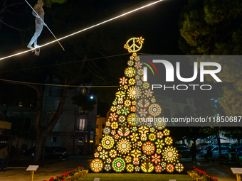 A Christmas tree stands in the Municipal Villa of Ruvo di Puglia on December 8, 2024. The courses and streets of Ruvo di Puglia's historic c...