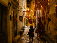 A street in the historic center of Ruvo di Puglia, Italy, on December 8, 2024, displays Christmas decorations. The courses and streets of Ru...