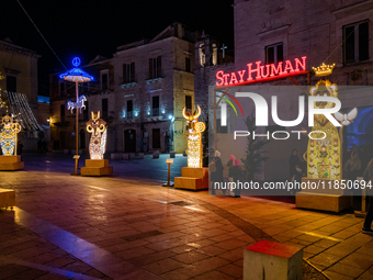 Artist lights illuminate Giacomo Matteotti Square in Ruvo di Puglia, Italy, on December 8, 2024. The courses and streets of Ruvo di Puglia's...