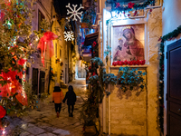 A street in the historic center of Ruvo di Puglia, Italy, on December 8, 2024, displays Christmas decorations. The courses and streets of Ru...