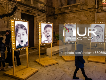 Artist lights illuminate Menotti Garibaldi Square in Ruvo di Puglia, Italy, on December 8, 2024. The courses and streets of Ruvo di Puglia's...