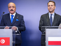 Mohamed Ali Nafti Tunisia's Minister of Foreign Affairs and Radoslaw Sikorski Poland's Minister of Foreign Affairs during press conference i...