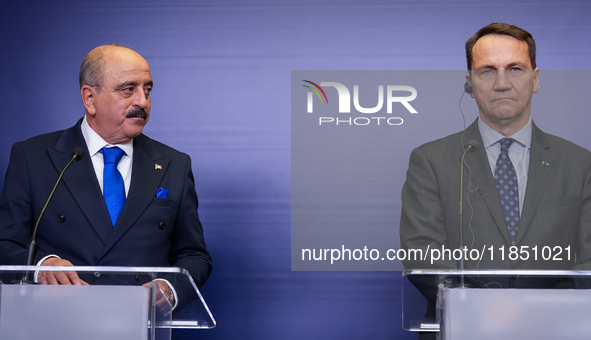 Mohamed Ali Nafti Tunisia's Minister of Foreign Affairs and Radoslaw Sikorski Poland's Minister of Foreign Affairs during press conference i...