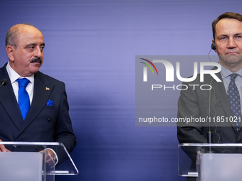 Mohamed Ali Nafti Tunisia's Minister of Foreign Affairs and Radoslaw Sikorski Poland's Minister of Foreign Affairs during press conference i...