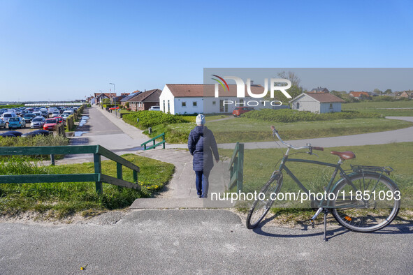 A general view of the city surroundings with a classic bike in the foreground is seen in Nordby, Fano Island, Denmark, on April 29, 2024. 