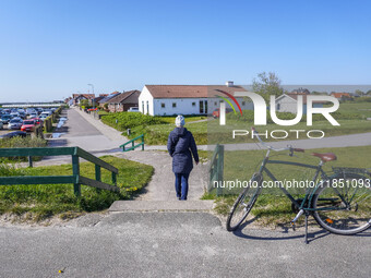 A general view of the city surroundings with a classic bike in the foreground is seen in Nordby, Fano Island, Denmark, on April 29, 2024. (