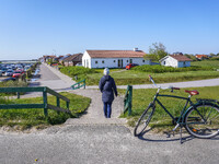 A general view of the city surroundings with a classic bike in the foreground is seen in Nordby, Fano Island, Denmark, on April 29, 2024. (