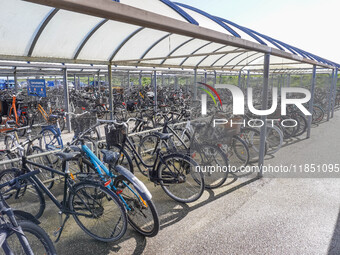 Hundreds of bikes are seen in the bike parking area in Nordby, Fano Island, Denmark, on April 29, 2024. (