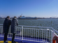 People look at the Esbjerg port in Nordby, Fano Island, Denmark, on April 29, 2024 (