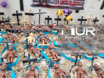 People hold crosses during a demonstration in downtown Sao Paulo, Brazil, on December 9, 2024, to protest against police violence following...