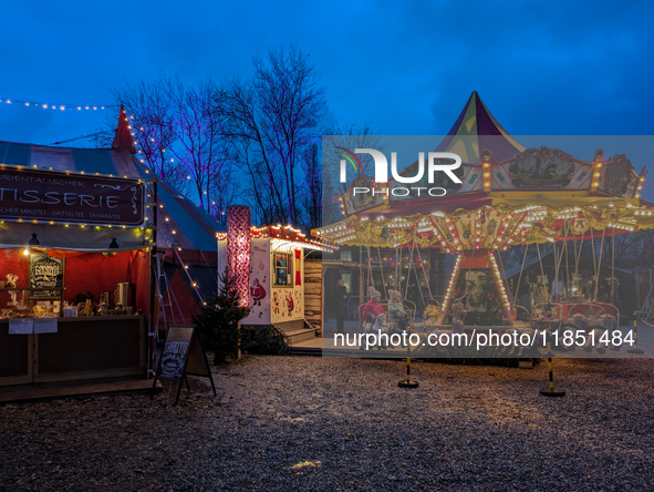 The Märchenbazar at the Olympic Park South in Munich, Bavaria, Germany, on December 9, 2024, offers a unique experience for visitors. Runnin...