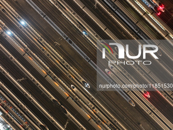 Emu trains are parked at the Nanjing South Bullet Train station in Nanjing, China, on December 10, 2024. (