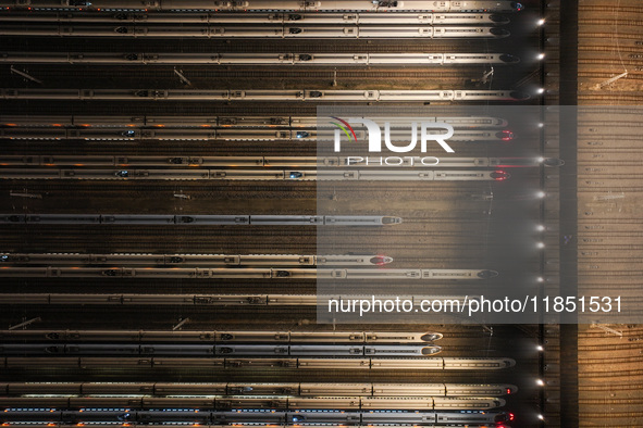 Emu trains are parked at the Nanjing South Bullet Train station in Nanjing, China, on December 10, 2024. 