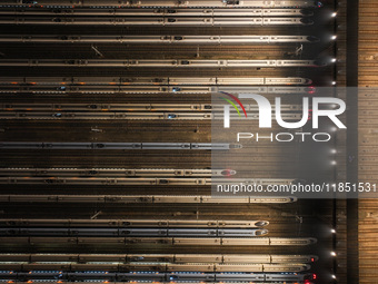 Emu trains are parked at the Nanjing South Bullet Train station in Nanjing, China, on December 10, 2024. (