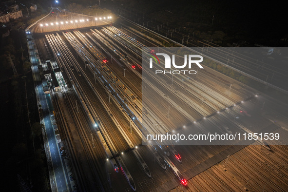 Emu trains are parked at the Nanjing South Bullet Train station in Nanjing, China, on December 10, 2024. 