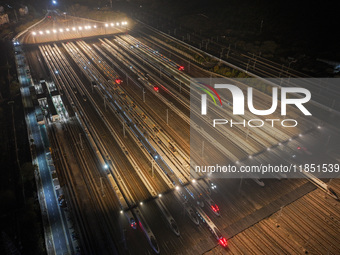 Emu trains are parked at the Nanjing South Bullet Train station in Nanjing, China, on December 10, 2024. (