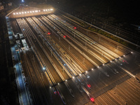 Emu trains are parked at the Nanjing South Bullet Train station in Nanjing, China, on December 10, 2024. (