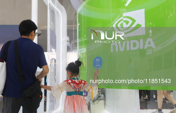 Visitors visit the NVIDIA booth at the INCLUSION Conference on the Bund in Shanghai, China, on September 7, 2024. 