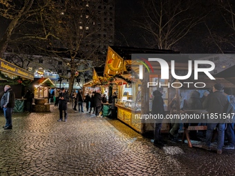 The Neuhauser Christmas Market at Rotkreuzplatz in Munich, Bavaria, Germany, on December 9, 2024, offers a welcoming and relaxed atmosphere,...