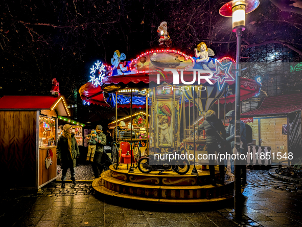 The Neuhauser Christmas Market at Rotkreuzplatz in Munich, Bavaria, Germany, on December 9, 2024, offers a welcoming and relaxed atmosphere,...