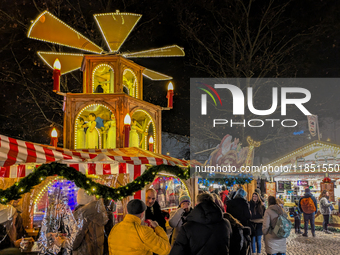 The Neuhauser Christmas Market at Rotkreuzplatz in Munich, Bavaria, Germany, on December 9, 2024, offers a welcoming and relaxed atmosphere,...