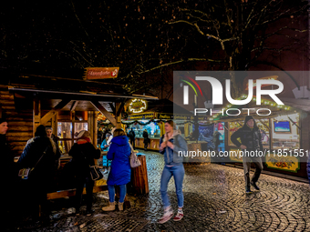 The Neuhauser Christmas Market at Rotkreuzplatz in Munich, Bavaria, Germany, on December 9, 2024, offers a welcoming and relaxed atmosphere,...