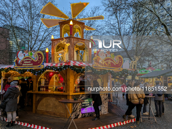 The Neuhauser Christmas Market at Rotkreuzplatz in Munich, Bavaria, Germany, on December 9, 2024, offers a welcoming and relaxed atmosphere,...