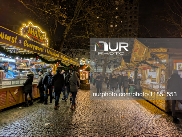 The Neuhauser Christmas Market at Rotkreuzplatz in Munich, Bavaria, Germany, on December 9, 2024, offers a welcoming and relaxed atmosphere,...