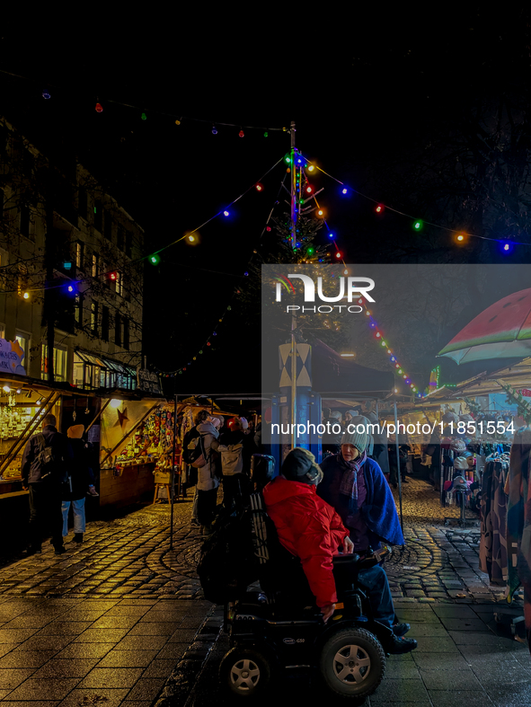 The Neuhauser Christmas Market at Rotkreuzplatz in Munich, Bavaria, Germany, on December 9, 2024, offers a welcoming and relaxed atmosphere,...