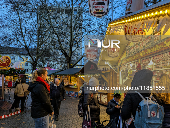 The Neuhauser Christmas Market at Rotkreuzplatz in Munich, Bavaria, Germany, on December 9, 2024, offers a welcoming and relaxed atmosphere,...