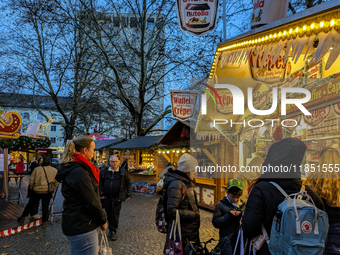 The Neuhauser Christmas Market at Rotkreuzplatz in Munich, Bavaria, Germany, on December 9, 2024, offers a welcoming and relaxed atmosphere,...