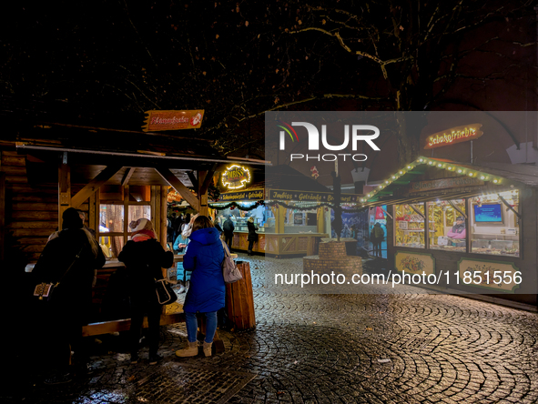 The Neuhauser Christmas Market at Rotkreuzplatz in Munich, Bavaria, Germany, on December 9, 2024, offers a welcoming and relaxed atmosphere,...