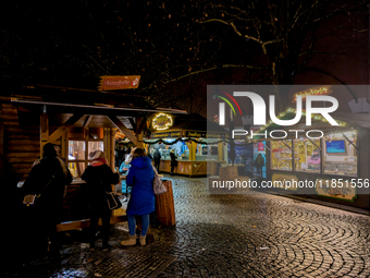 The Neuhauser Christmas Market at Rotkreuzplatz in Munich, Bavaria, Germany, on December 9, 2024, offers a welcoming and relaxed atmosphere,...