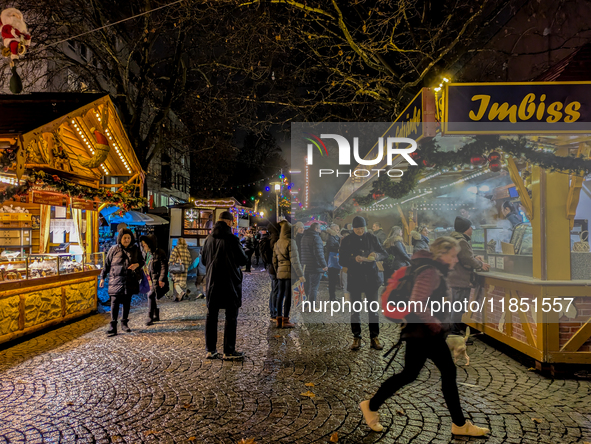 The Neuhauser Christmas Market at Rotkreuzplatz in Munich, Bavaria, Germany, on December 9, 2024, offers a welcoming and relaxed atmosphere,...