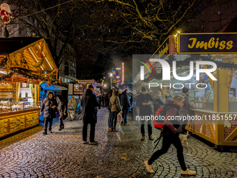 The Neuhauser Christmas Market at Rotkreuzplatz in Munich, Bavaria, Germany, on December 9, 2024, offers a welcoming and relaxed atmosphere,...