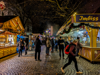 The Neuhauser Christmas Market at Rotkreuzplatz in Munich, Bavaria, Germany, on December 9, 2024, offers a welcoming and relaxed atmosphere,...