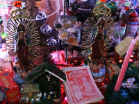 Two figures of the Virgin of Guadalupe and various items for the Christmas season and the Posadas are at a stand installed in the Tlalpan Ce...