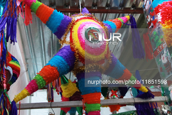 A pinata is seen at a tianguis, where different items are sold for the Christmas season and the posadas, in the Tlalpan Center in Mexico Cit...