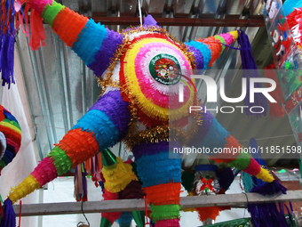 A pinata is seen at a tianguis, where different items are sold for the Christmas season and the posadas, in the Tlalpan Center in Mexico Cit...