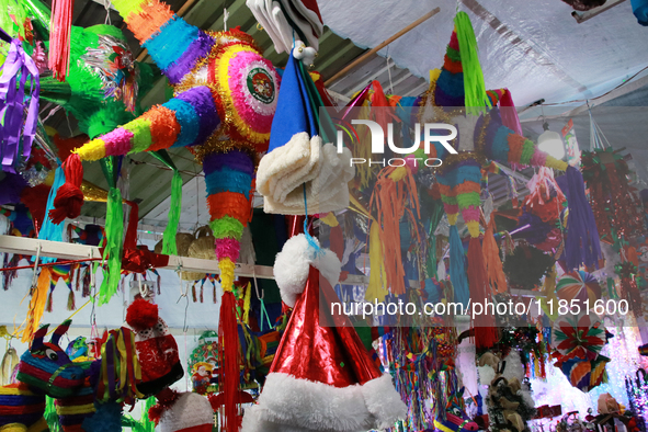 Various items for the Christmas and Posadas season are sold at a market set up in the Tlalpan Center in Mexico City, Mexico, on December 7,...