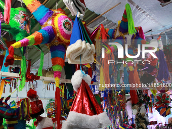 Various items for the Christmas and Posadas season are sold at a market set up in the Tlalpan Center in Mexico City, Mexico, on December 7,...