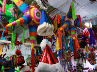 Various items for the Christmas and Posadas season are sold at a market set up in the Tlalpan Center in Mexico City, Mexico, on December 7,...