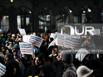 Anti-government demonstrators gather outside the parliament for a twelfth consecutive day of mass protests against the government's postpone...