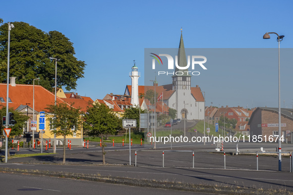 A church and lighthouse are seen in Ronne, Bornholm Island, Denmark, on August 6, 2024. 