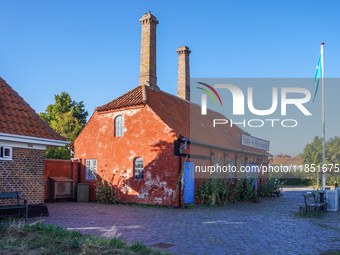 An old red building in the port is seen in Ronne, Bornholm Island, Denmark, on August 6, 2024. (