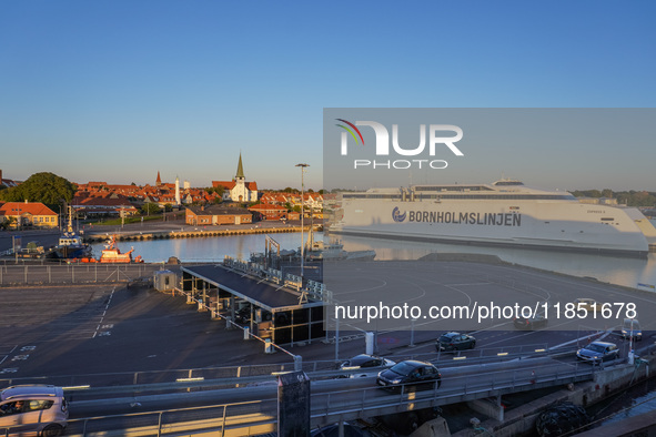 A general view of the ferry terminal in the port with a Bornholmslinjen ferry in the background is seen in Ronne, Bornholm Island, Denmark,...