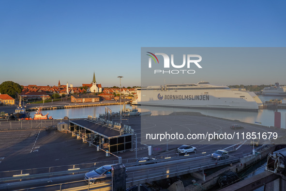 A general view of the ferry terminal in the port with a Bornholmslinjen ferry in the background is seen in Ronne, Bornholm Island, Denmark,...